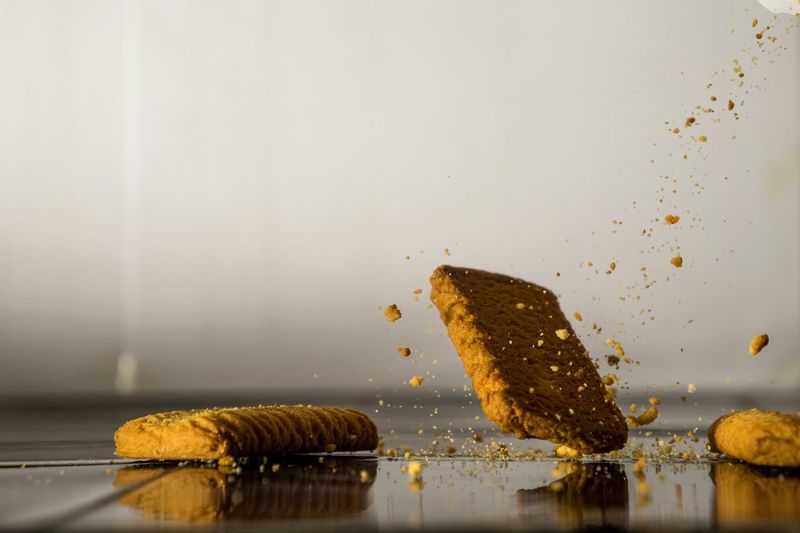 Falling biscuits and crumbles reflecting surface