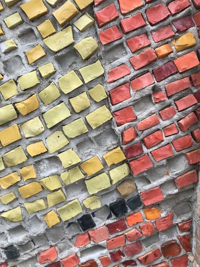 Full frame shot of multi colored brick wall