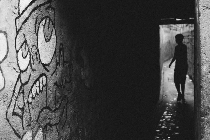 Man walking on graffiti