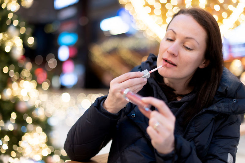 Young woman smoking cigarette
