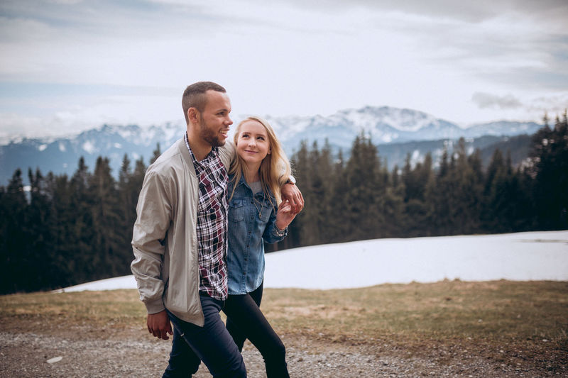 Young couple standing on mountain