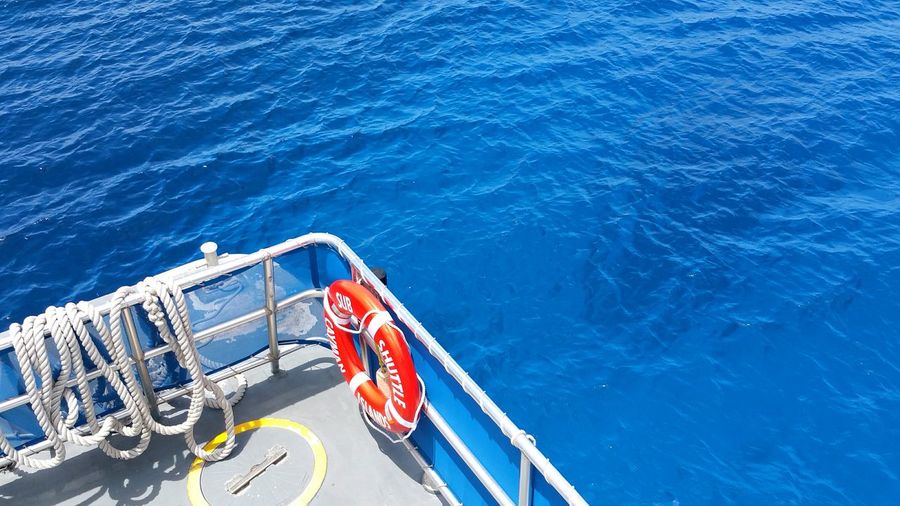 High angle view of cropped boat in sea