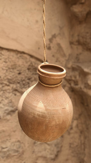 Close-up of pot against wall