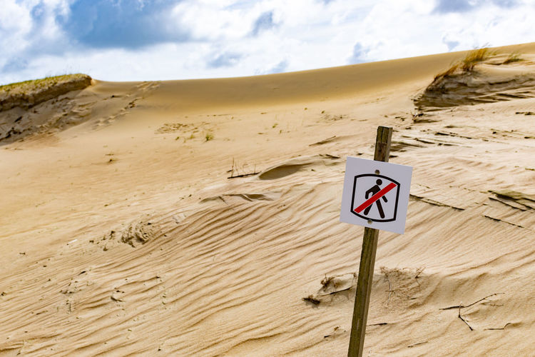 Access prohibited sign or symbol on sand hills dunes, stop, no entry, no walk, no walk