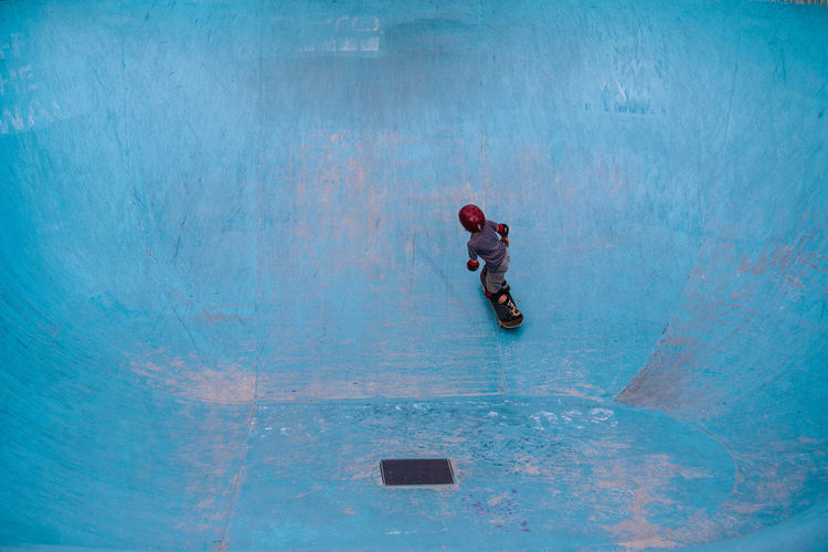 High angle view of boy skateboarding at park