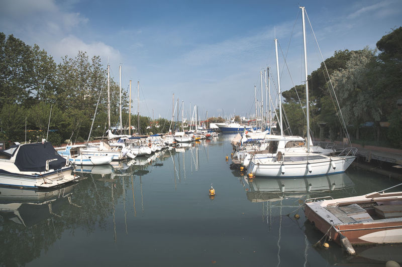 The canal port in cesenatico with moored boats in emilia romagna adriatic sea italy