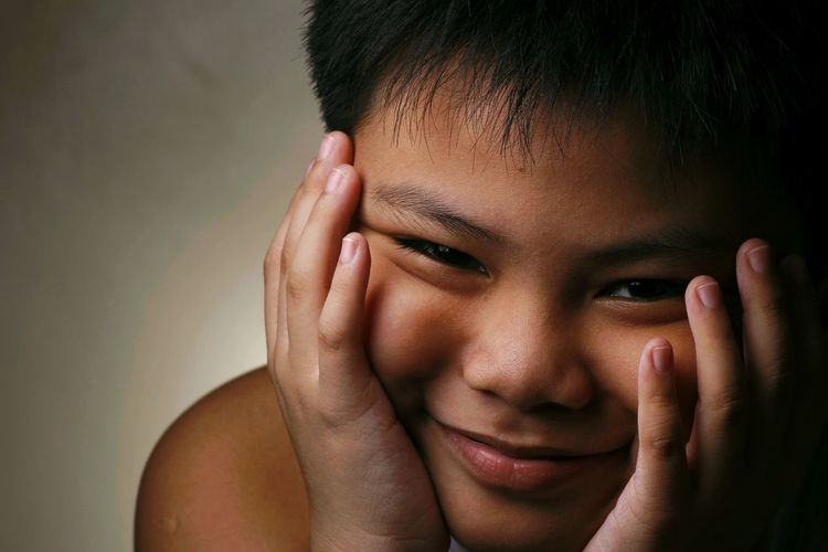 Close-up portrait of boy smiling