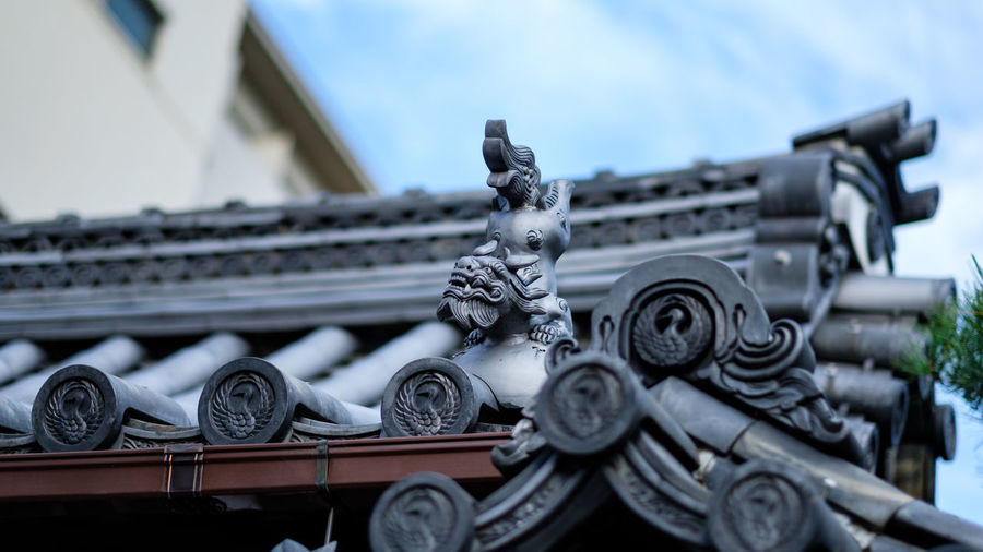 A metallic roof ornament, one among many at kyoto, japan.