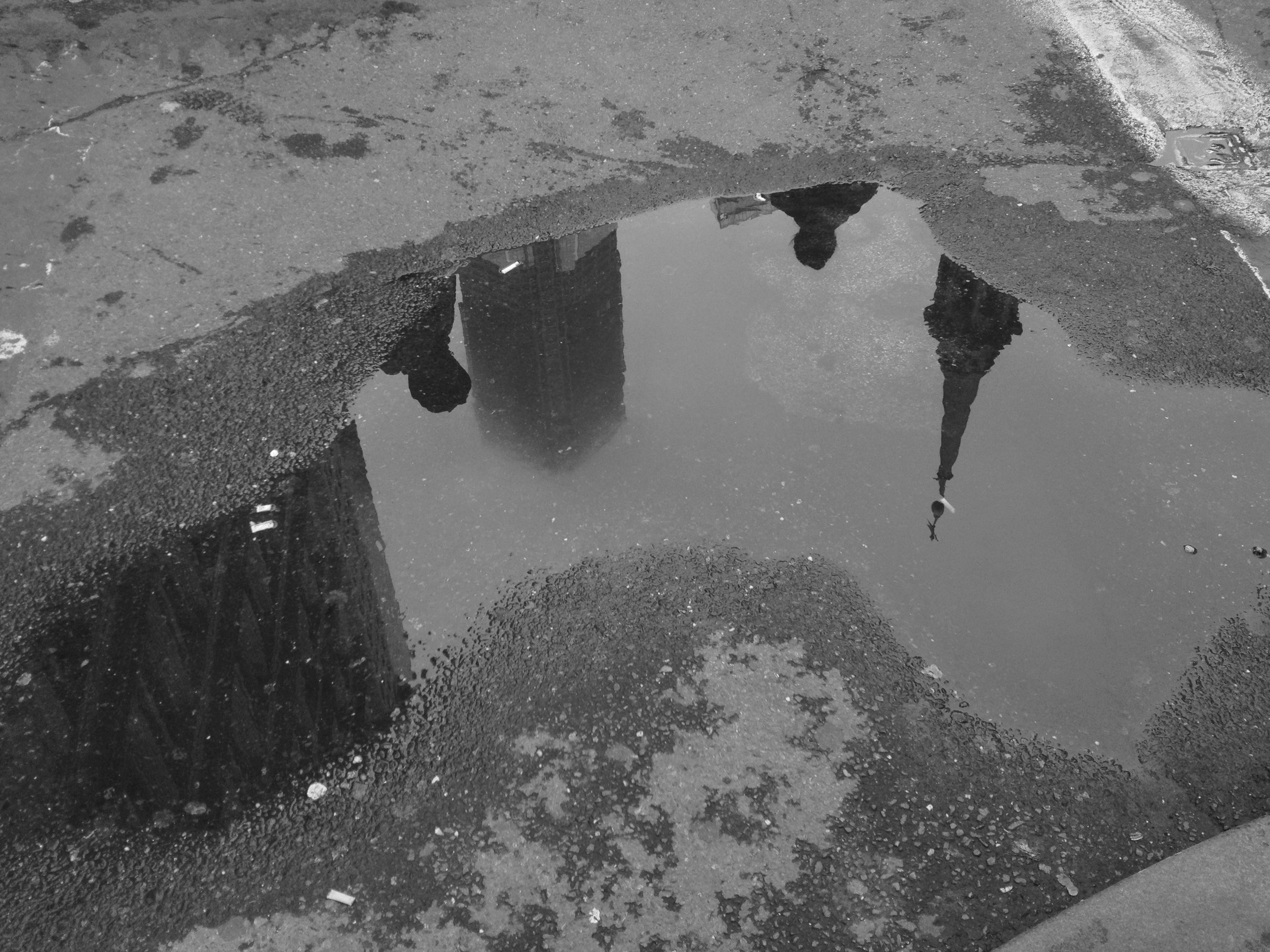 water, puddle, reflection, wet, high angle view, rain, season, weather, drop, street, nature, standing water, day, outdoors, no people, lake, monsoon, frozen, winter, waterfront