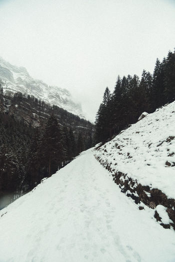Snow covered mountain against sky