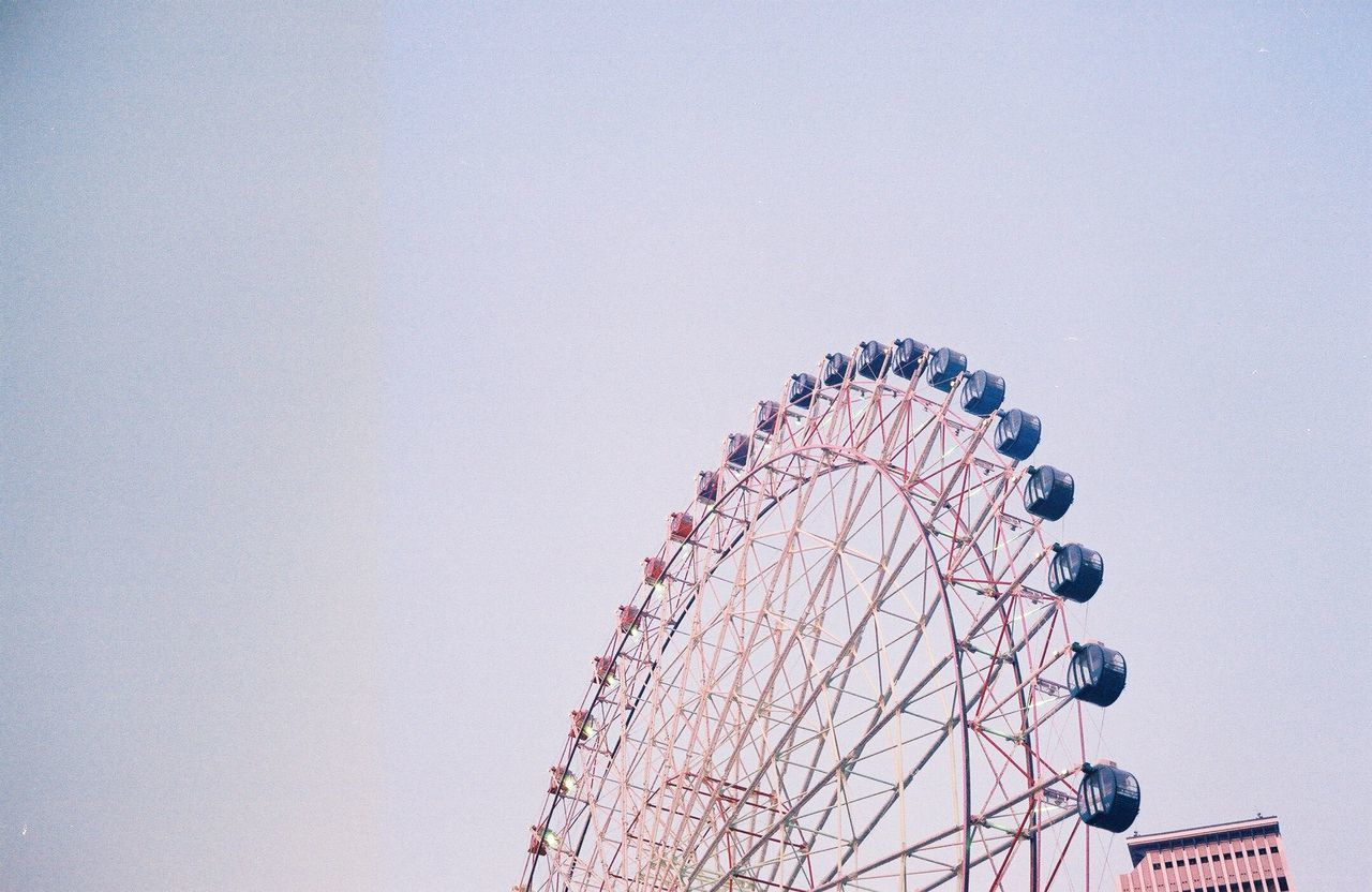 FERRIS WHEEL AGAINST SKY