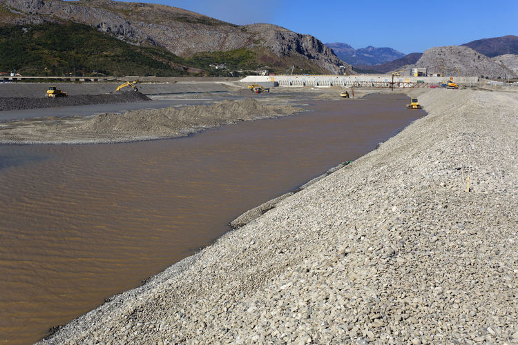 The construction of the ashta dam on the drini river, albania