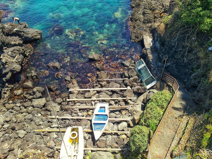 High angle view of steps by sea