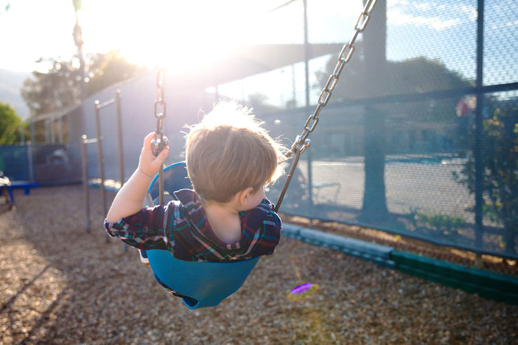 Boy on swing at playground