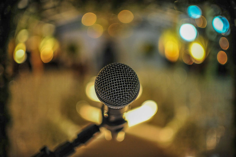 High angle view of microphone in illuminated room