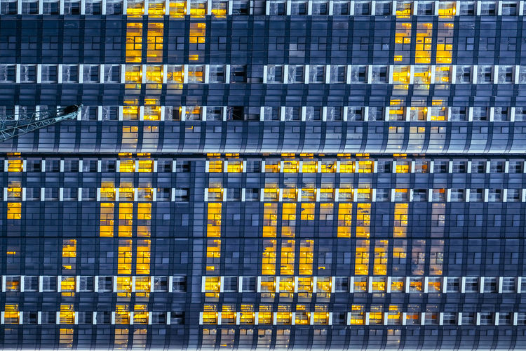 Full frame shot of yellow office building