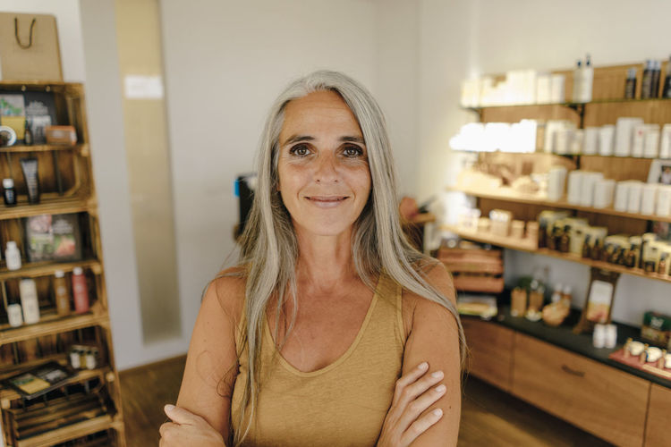 Portrait of smiling businesswoman in her shop
