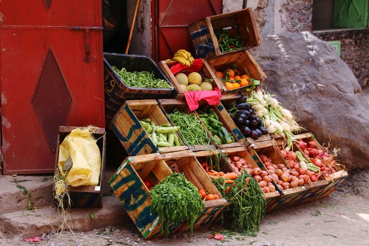 Various fruits and vegetables for sale at market stall