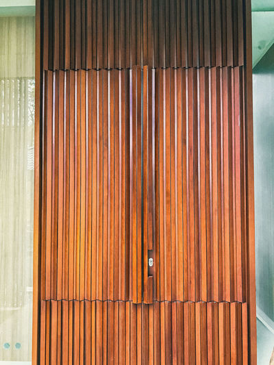 Full frame shot of closed wooden door.