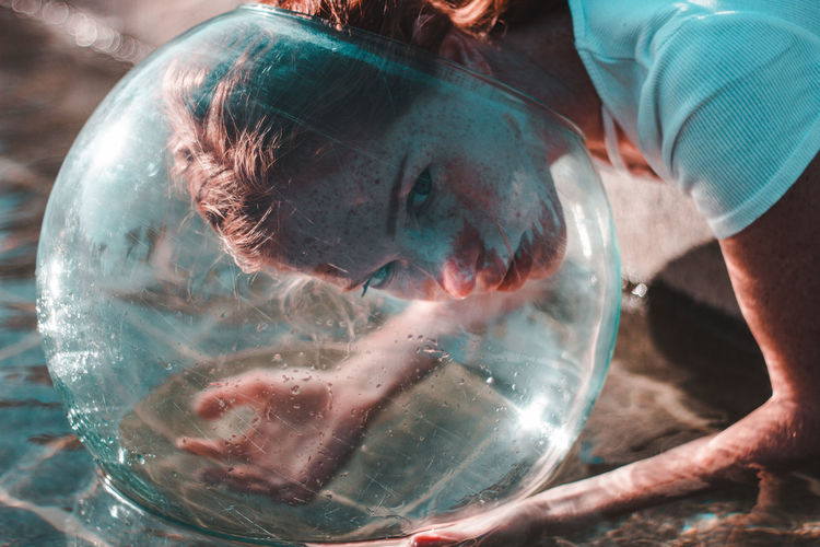 Close-up of woman swimming in water