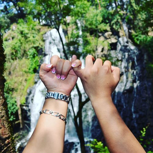Cropped hand making pinky promise
