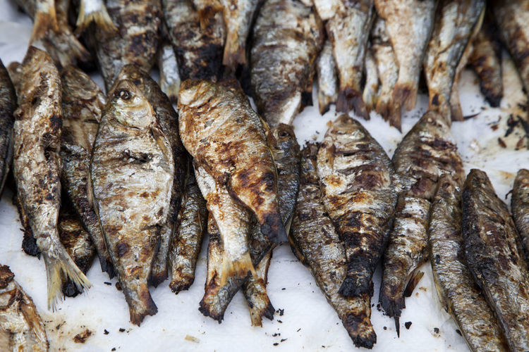 High angle view of fried fishes for sale in market
