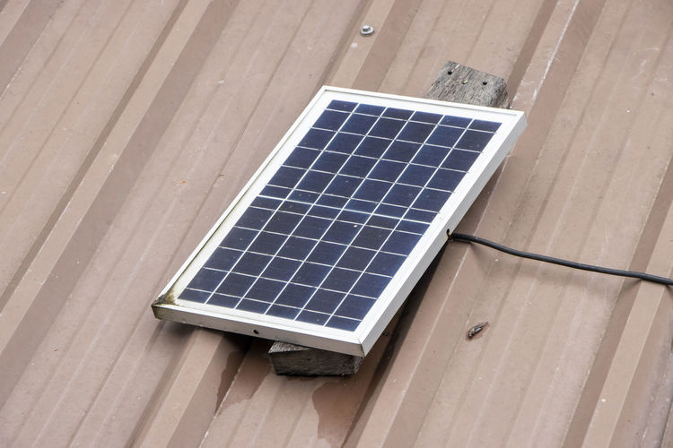 High angle view of solar panels on table