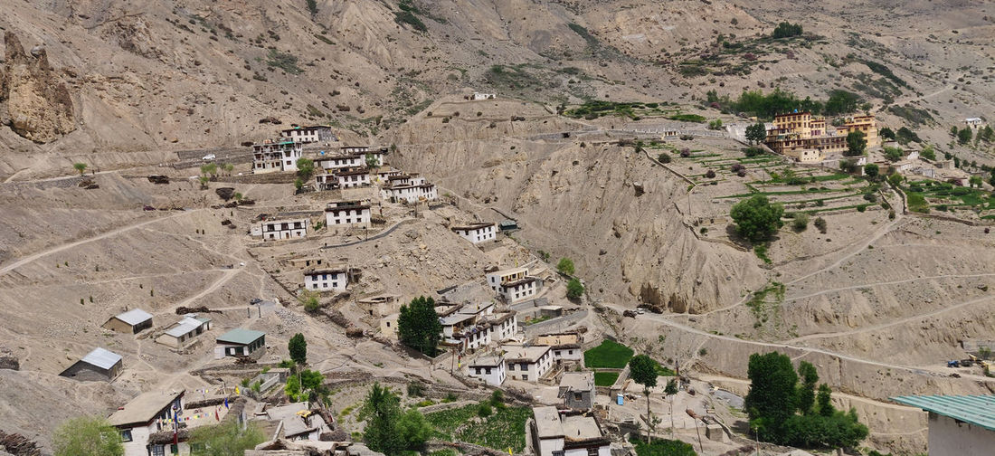 Remote cold desert village with identical houses.