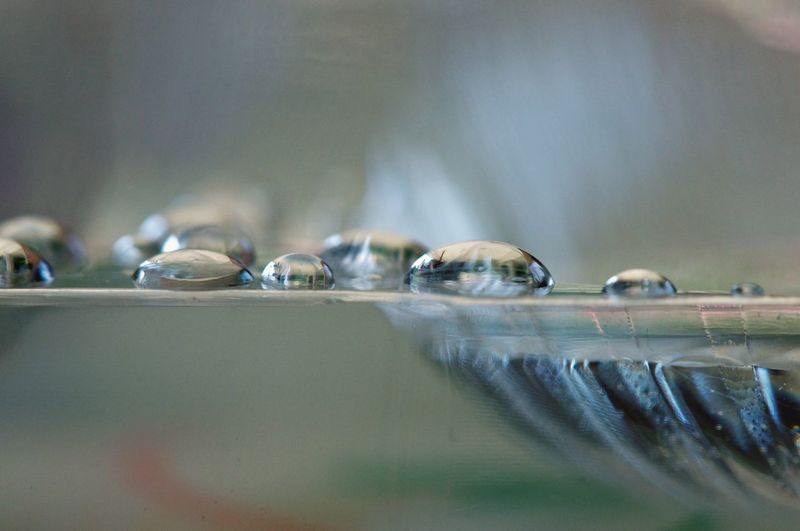 Close-up of drops in water