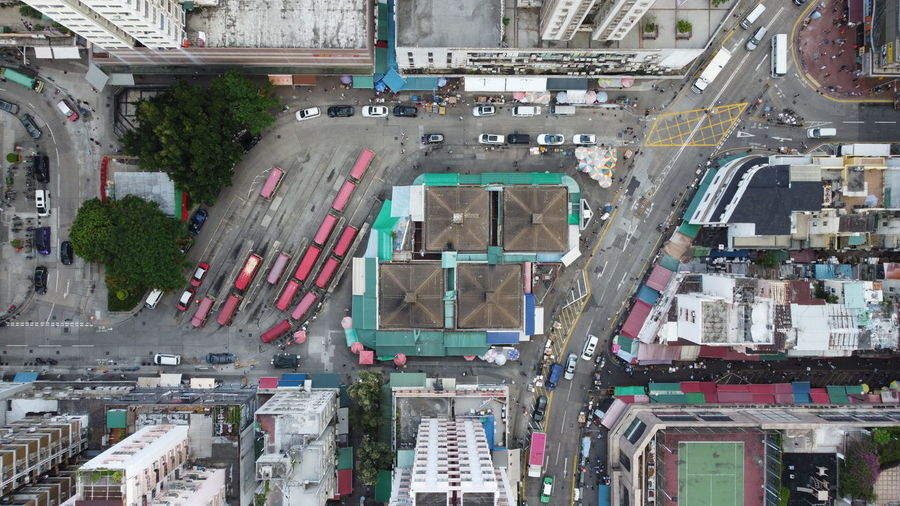 High angle view of traffic on road amidst buildings
