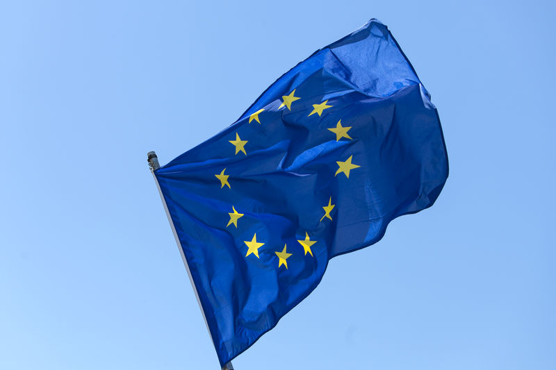 Low angle view of european union flag against clear blue sky