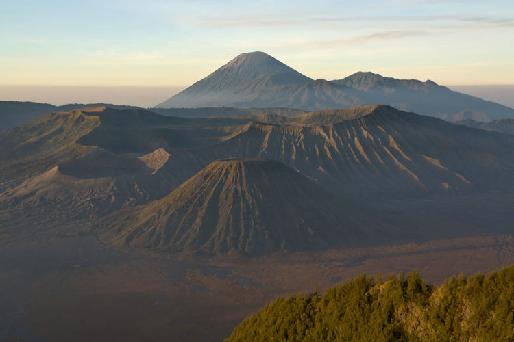View of volcanic landscape against sky
