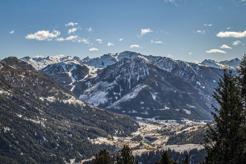 View over the beautiful snow-covered fassa valley in the dolomites from the rosengarten ski area