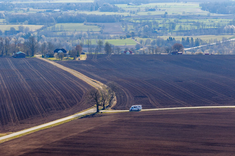 Rural landscape view with a rv car on a road