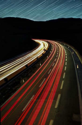 Light trails on road at night