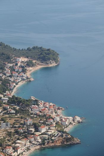 Aerial view of sea and houses