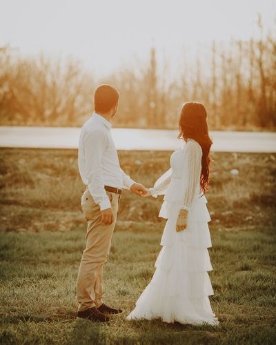 Full length of couple standing outdoors