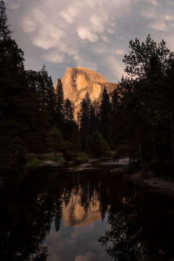 Half dome and unique cloud formations for sunset in yosemite national park - california