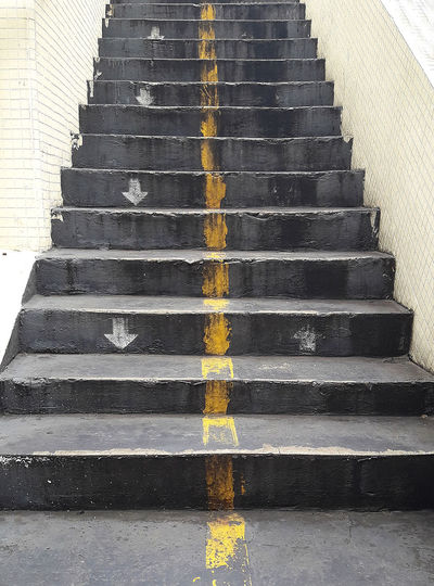 High angle view of yellow steps on building