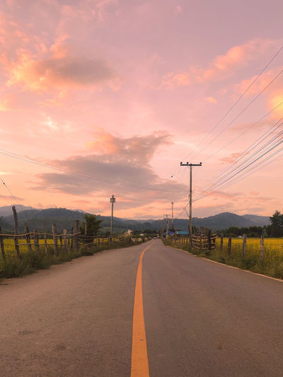Road against sky during sunset