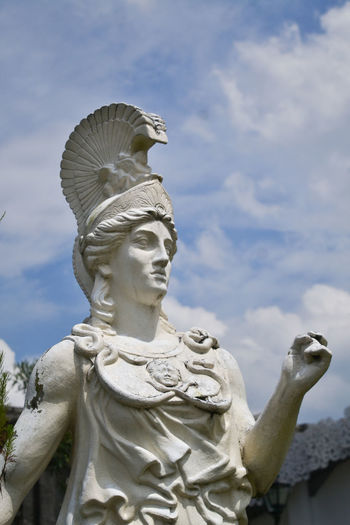 Athena statue with the blue sky background 