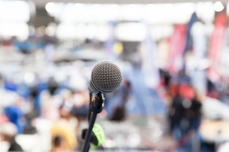 Close-up of microphone against blurred background