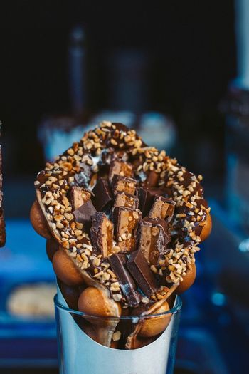 Close-up of chocolate waffle in glass on table