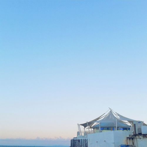 Ibiza beach club against clear blue sky