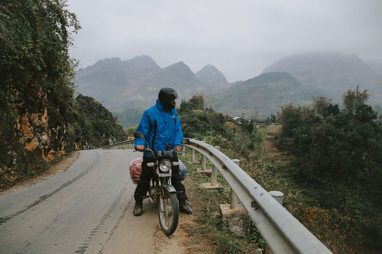 Man riding motorcycle on the mountain road