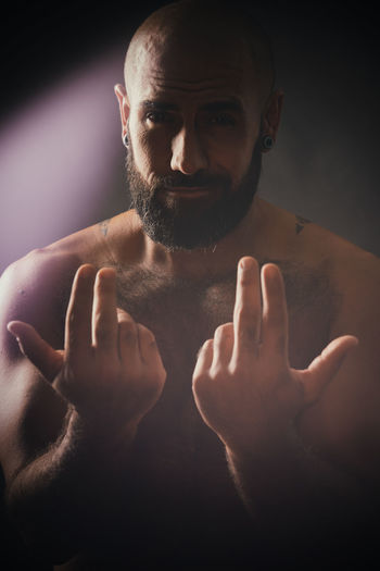 Portrait of shirtless man