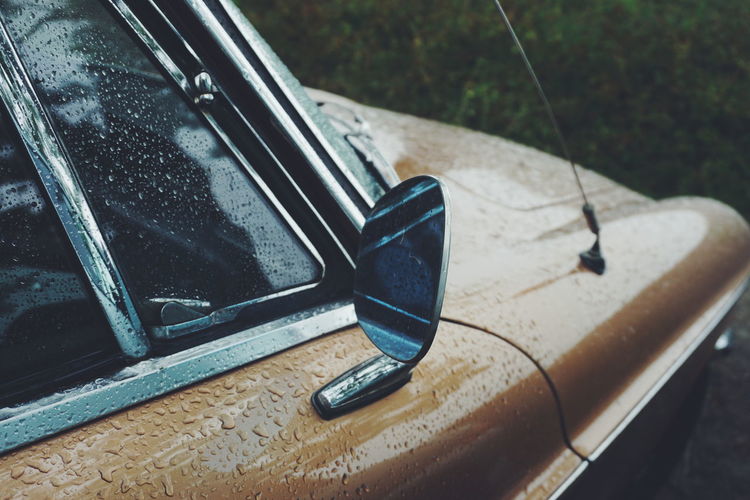 Cropped image of car during monsoon