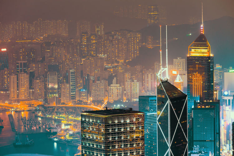 Illuminated buildings in city at night