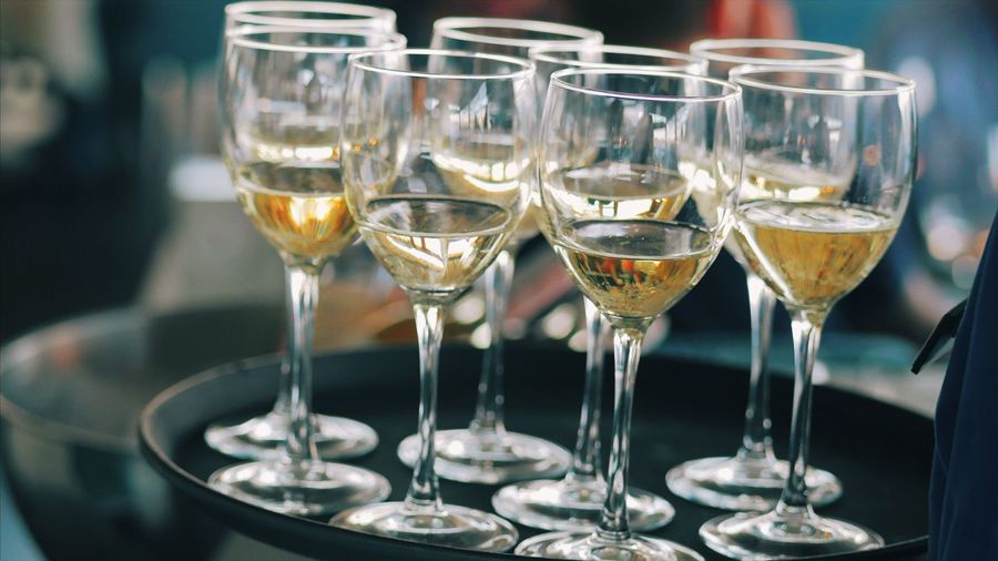 Close-up of champagne flutes on table
