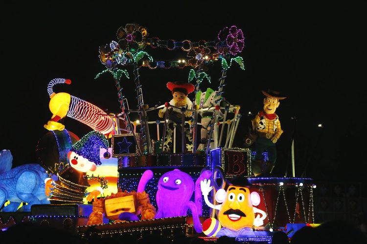 Illuminated christmas lights at amusement park